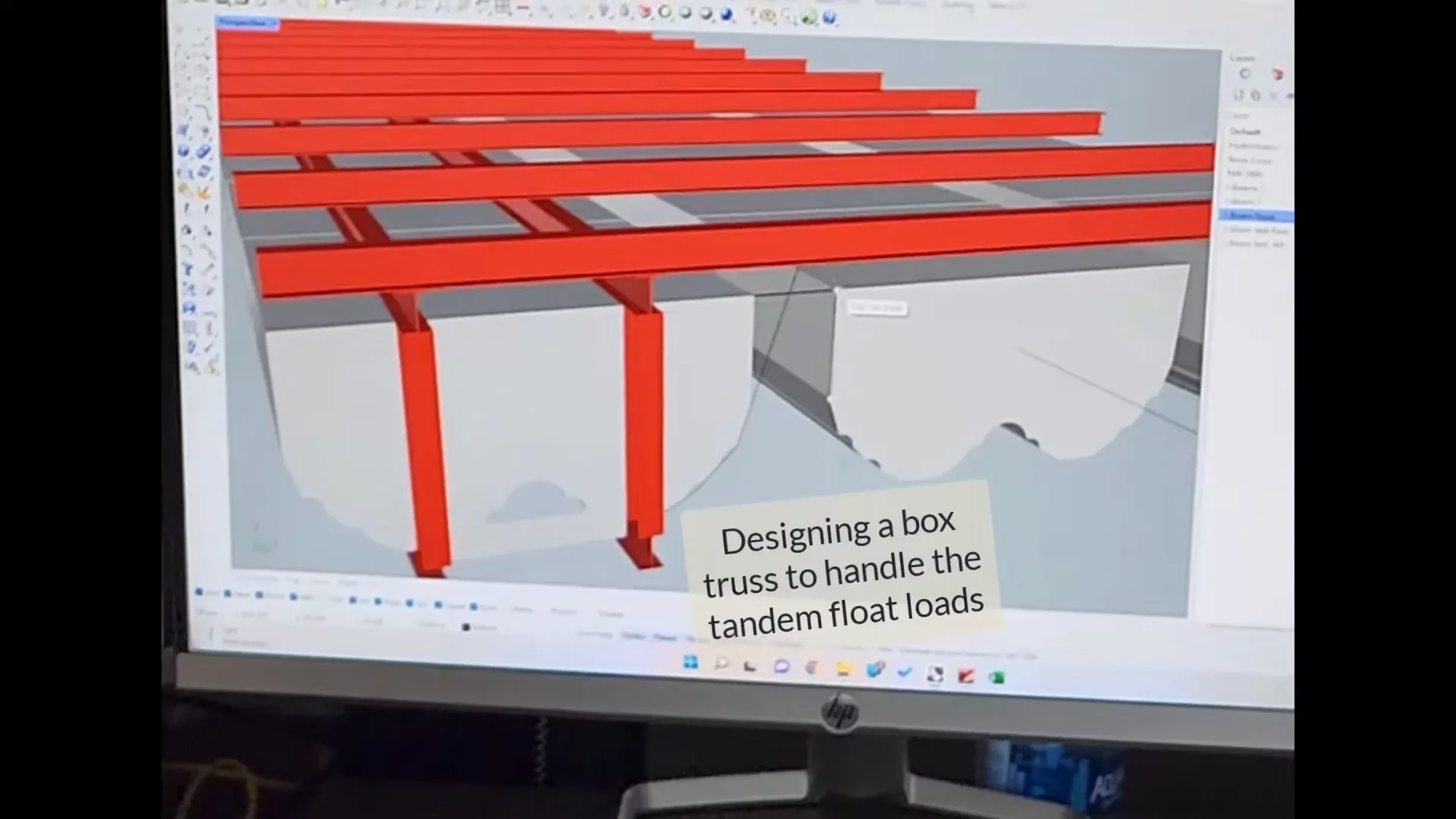 Consulting with a marine architect about barge design.