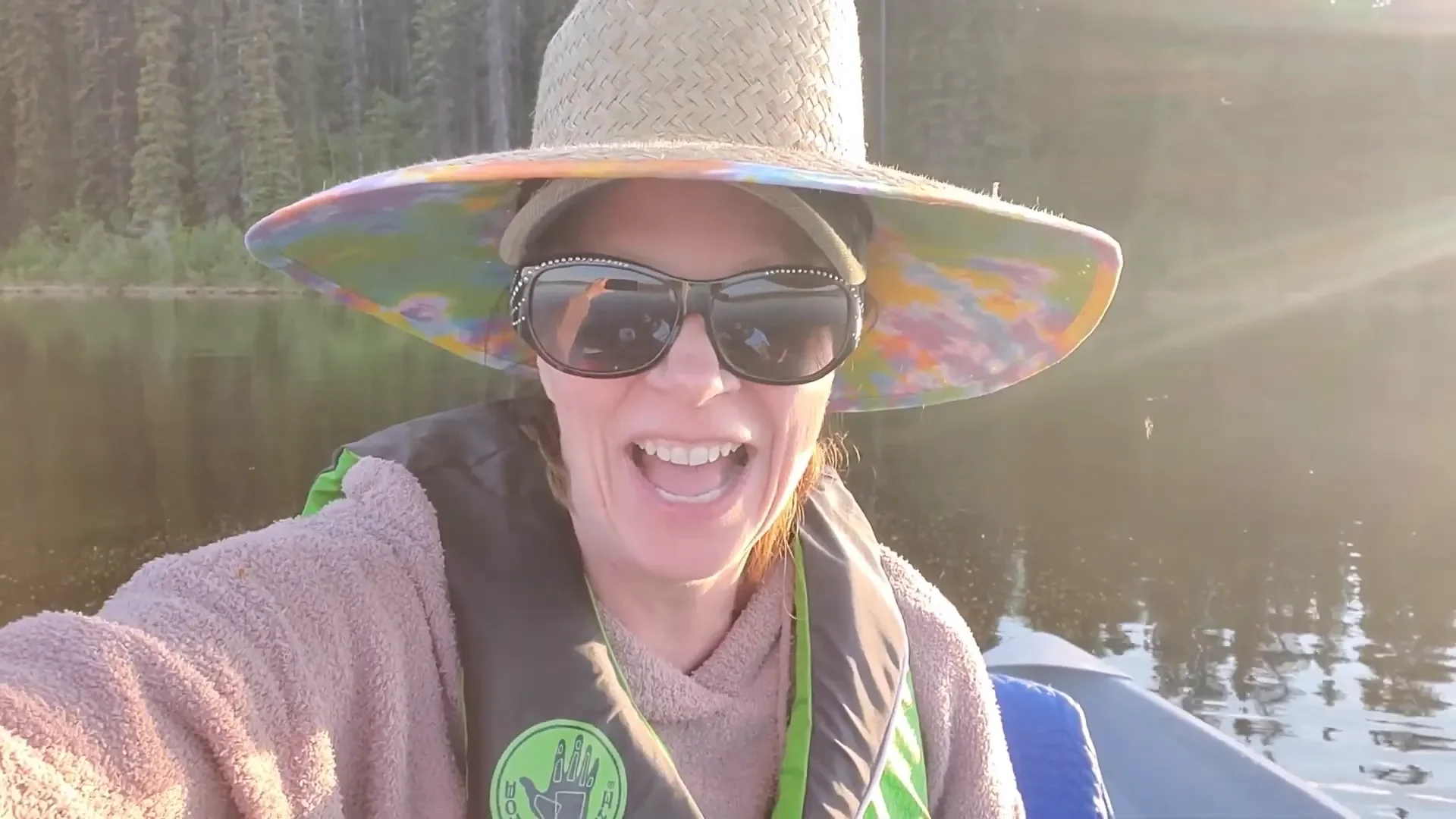 Melodi celebrating catching a fish.