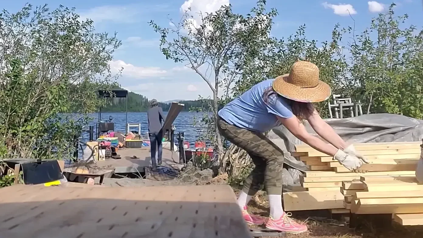 Amazing shed move - loading building materials onto the barge