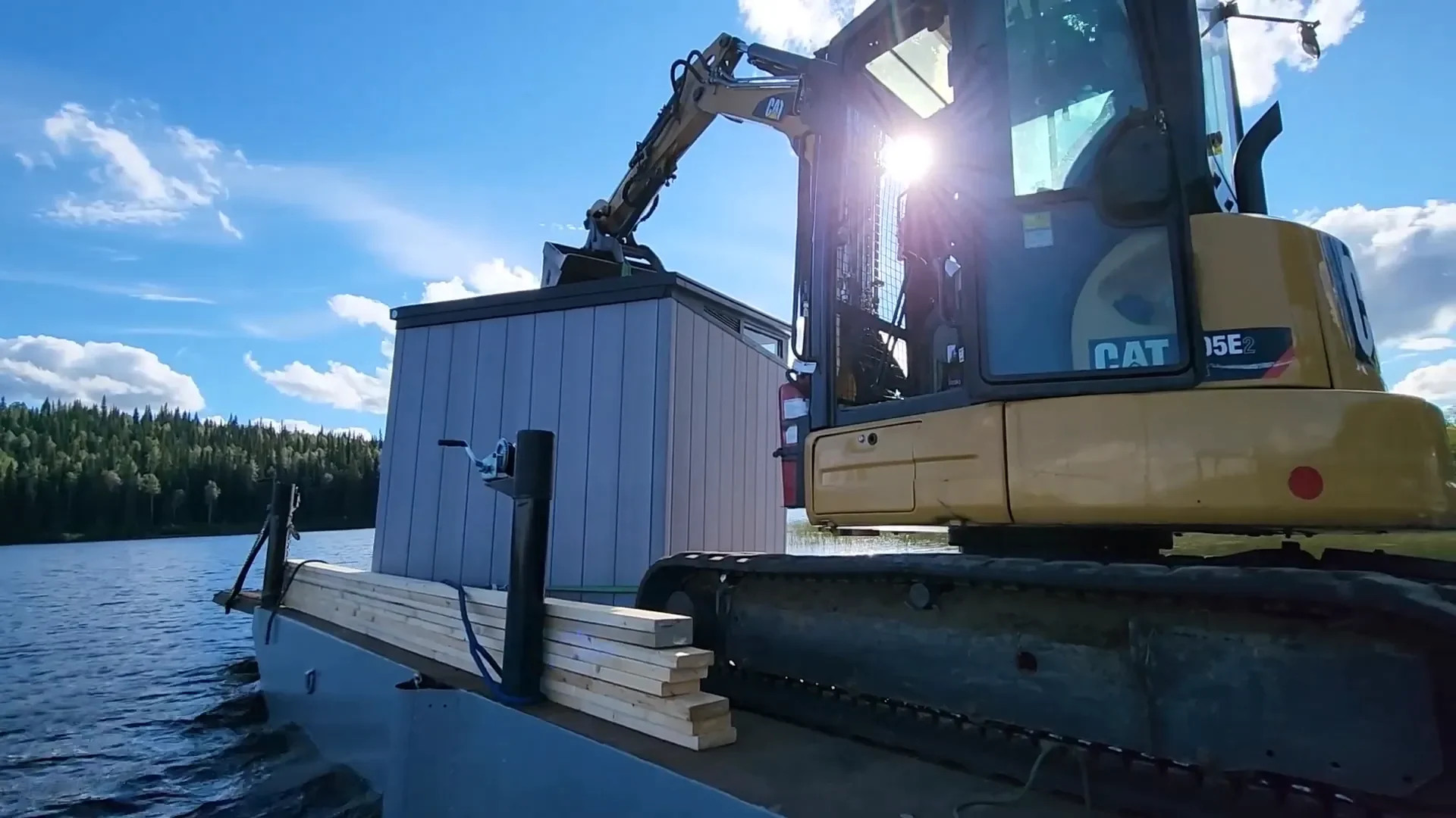Amazing shed move - shed on the barge ready to move