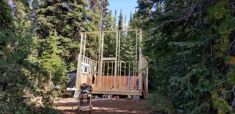 Early stages of framing a tiny cabin