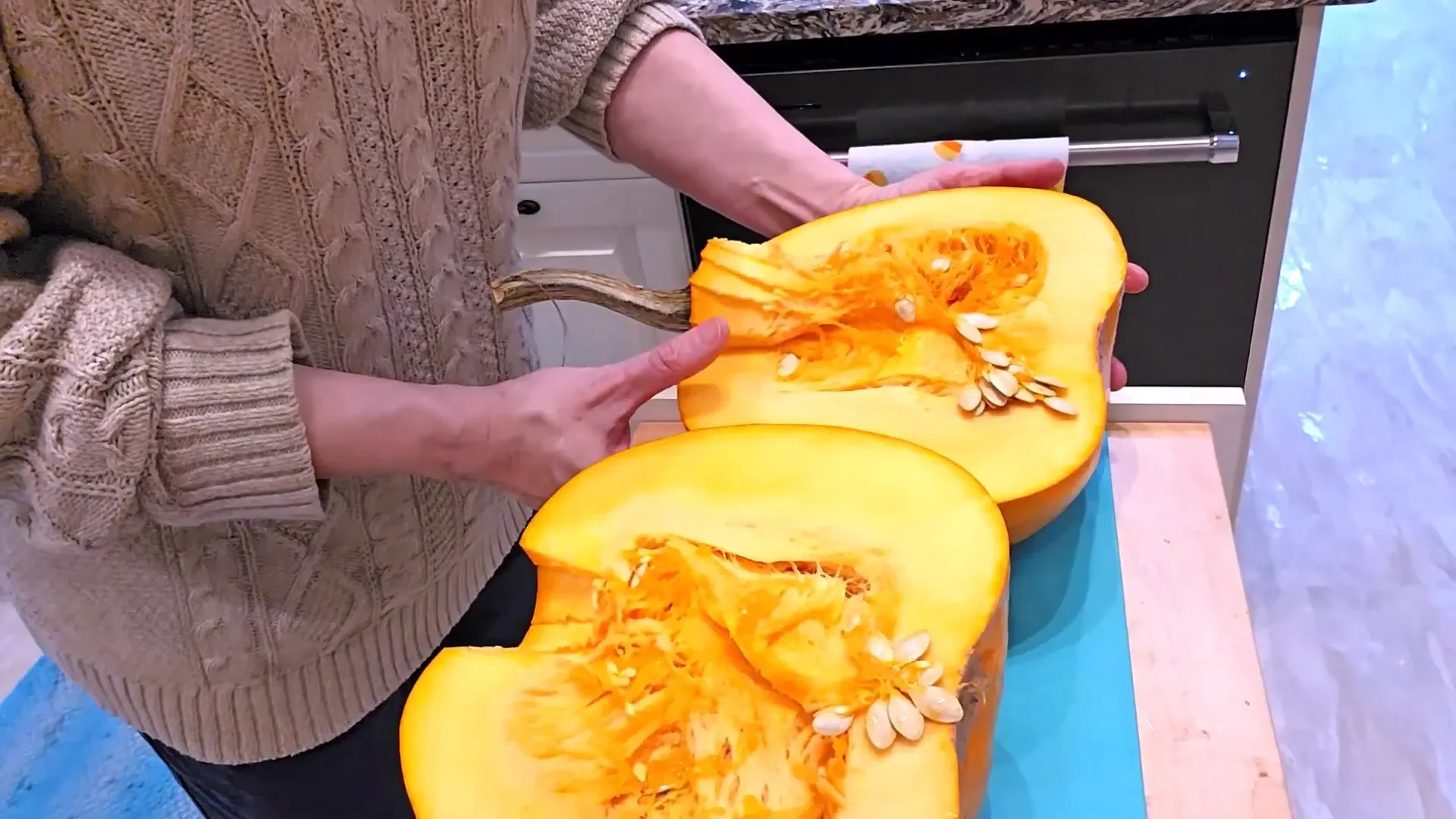 Melodi preparing to cut the pumpkin