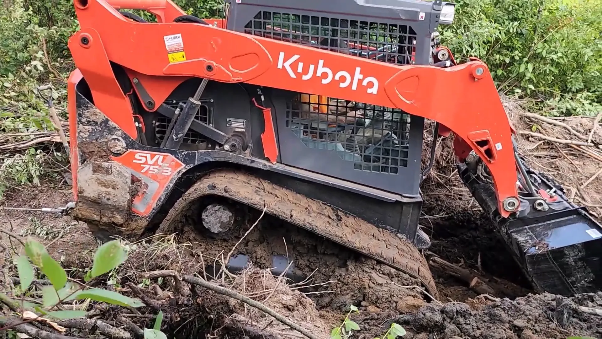 Is Our Toughest Task Too Tough? - S2 Ep27 5 A kubota svl75-3 is being pulled out of the mud by a winch