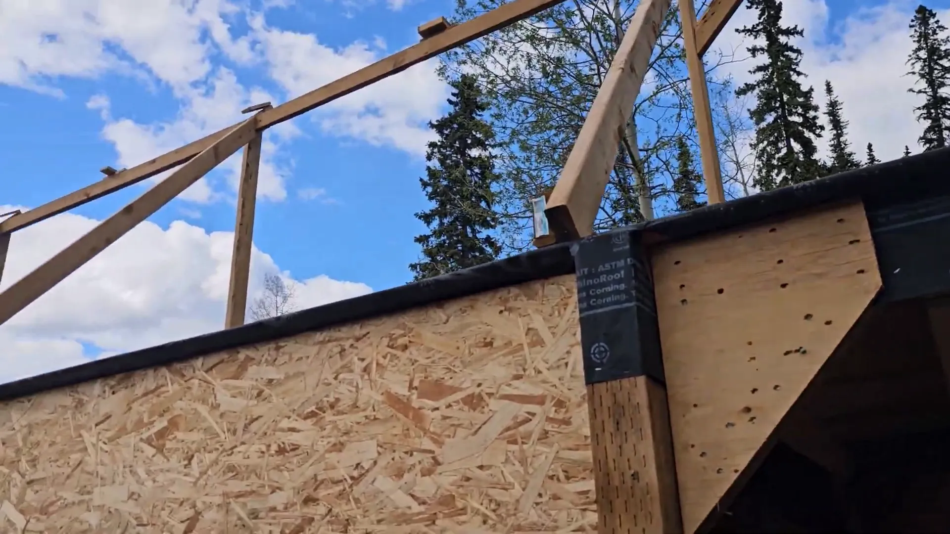 Off-Grid Island Winter Damage: What’s Still Standing? | S3 Ep2 4 Close up of solar panel racking with no bottom rail and no solar panels caused by winter damage