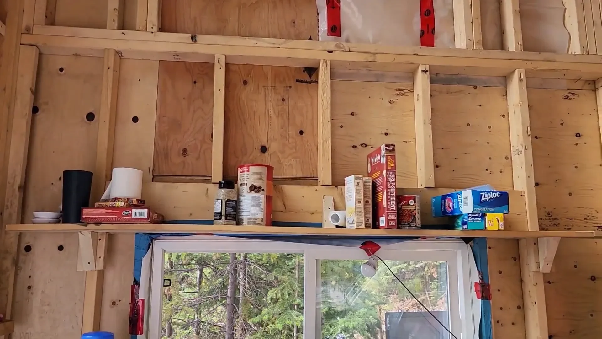 Moving Solar Panels to Our Island Homestead | S2 EP7 7 Makeshift shelving in the cabin