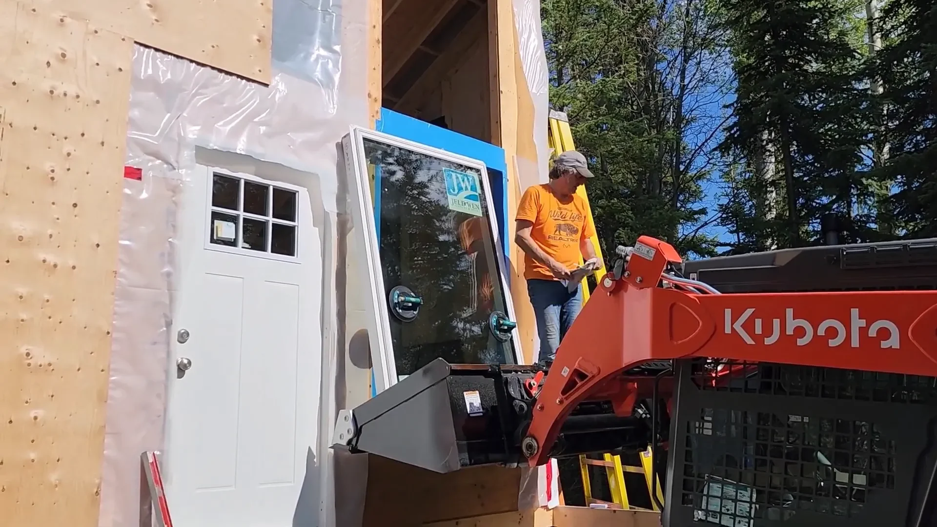 Tiny cabin windows installed - first window goes in!