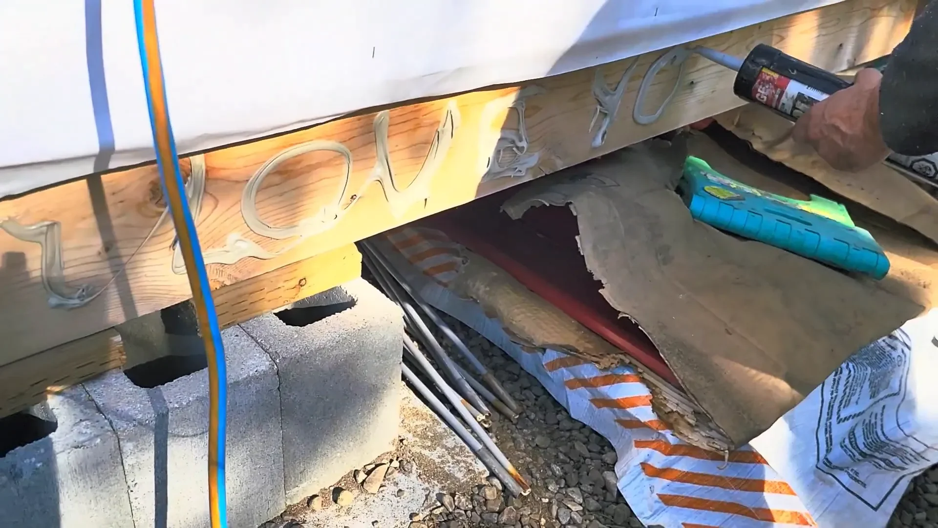 Drone tour private island - applying construction adhesive