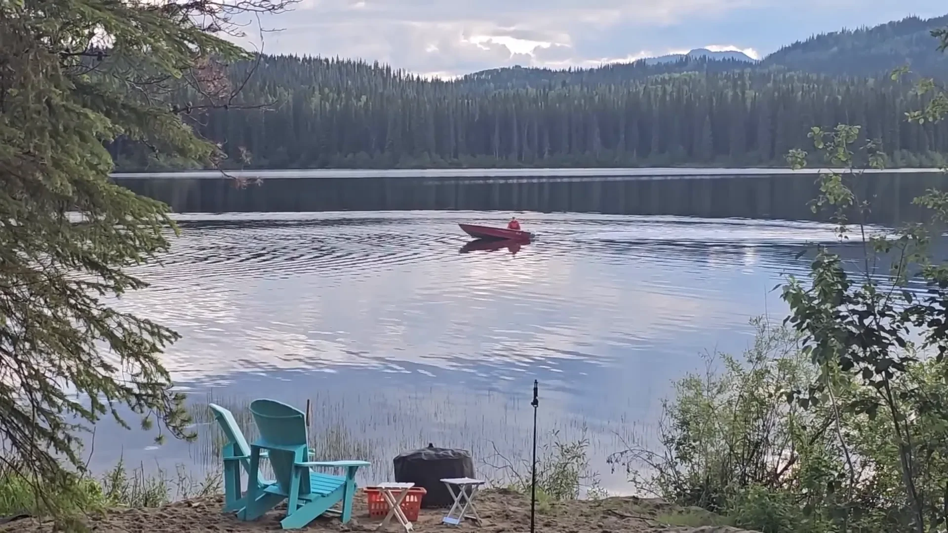 Wilderness island - ryan doing laundry in the boat.