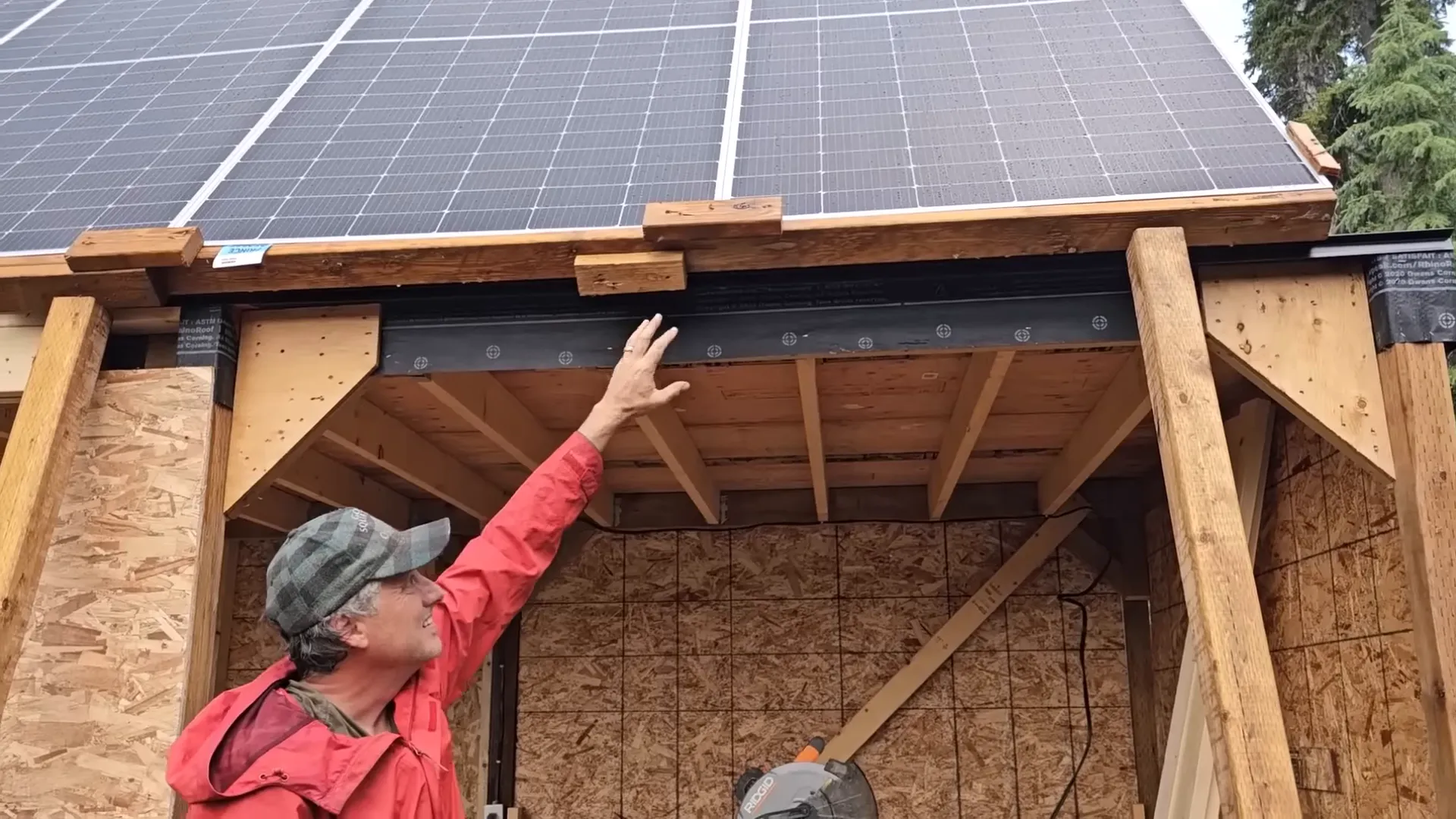 Ryan describing the drip edge and the solar array on the shed roof