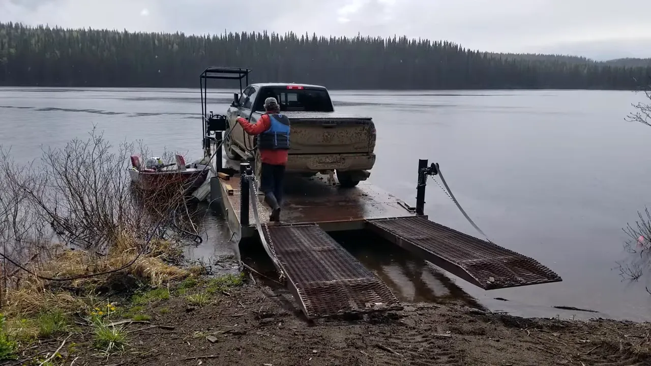 Off grid life on a remote island in canada – solar power, swamped boat & beating the storm - barge ramps and chains