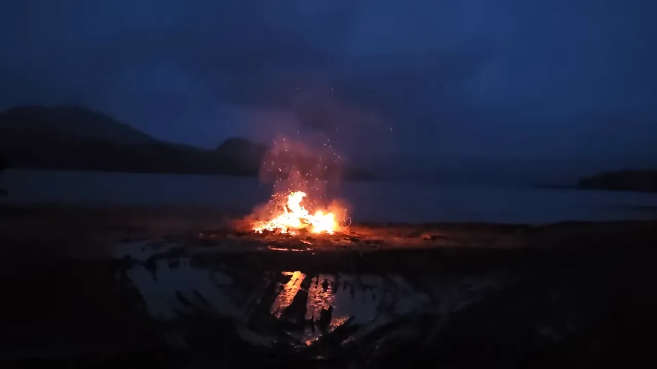 Off Grid Island Life After the Accident: Bonfire Cleanup, Winter-Proofing Solar –My Wild Holm S3Ep33 8 Campfire by dark lake - my wild holm - off grid wilderness living on a private island