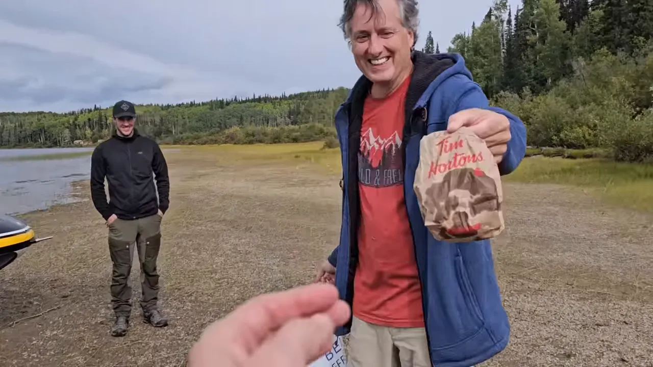Lakeside tim hortons bag handoff - my wild holm - off grid wilderness living on a private island